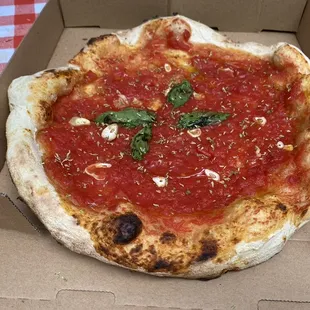 Marinara Pizza: sauce, basil, oregano, garlic, olive oil