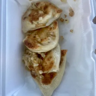 Pittsburg&apos;s Best Food Truck Pierogis (house-made) -- 4 served pan seared with onions for $8 (current as of May &apos;22)