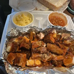 This is a small rib tips dinner with two sides. I choose mac-n-cheese and baked beans on this trip. Everything was delicious!