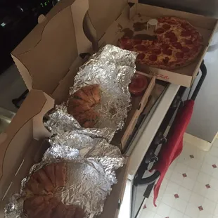 three pizzas in a box