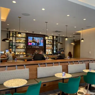 people sitting at the bar