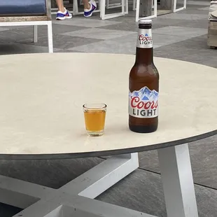 Shot of fireball and coors light.