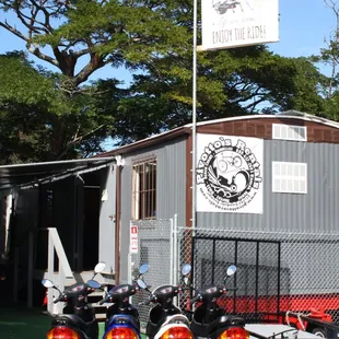 Our location is 5 minutes out of Haleiwa in the Waialua Shopping Center.