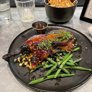 Summer Menu: roasted duck with sautéed green beans and crispy frites. One of the best meals Highland Park has ever seen!