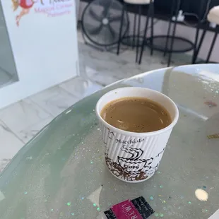 Lovely espresso in a cup that will not burn your fingers.