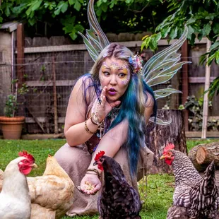 Pixie gossips with Chickens