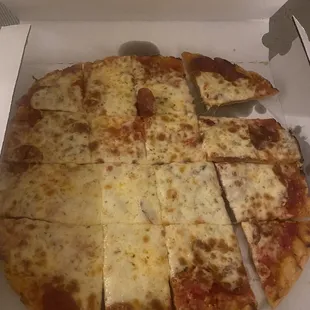 Cheese and Pepperoni Thin Crust Pizza with garlic