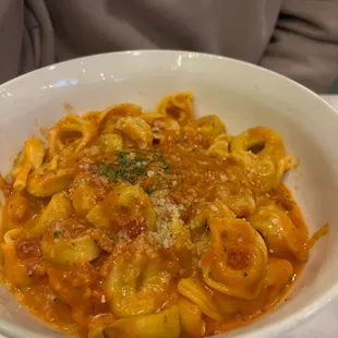 Cheese Tortellini with marinara and cream sauce.