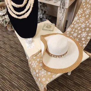 Beautiful necklace and hat by Michele.