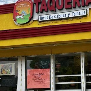 Restaurant sign and weekend menu