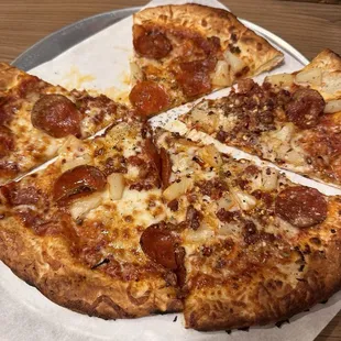 Pepperoni and pineapple pizza