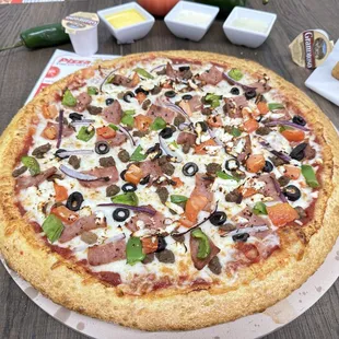 a whole pizza on a table