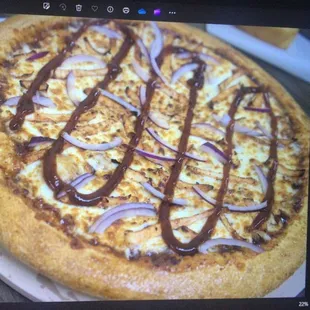 a picture of a pizza on a laptop screen