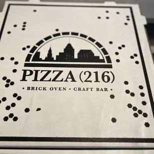 a close up of a pizza box