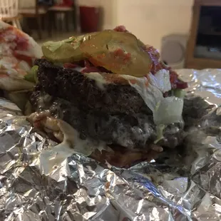 Double cheeseburger w/pickles bacon lettuce and ketchup