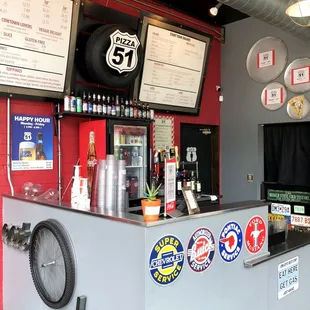 Counter Area with Happy Hour Details and Bottled Beer Options