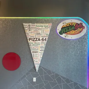 a pizza with a red dot on it