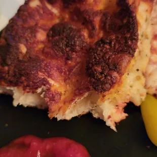 The top of the pizza.