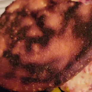 The bottom of the pizza