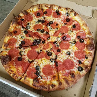 Large Pizza with Pepperoni and Black Olives