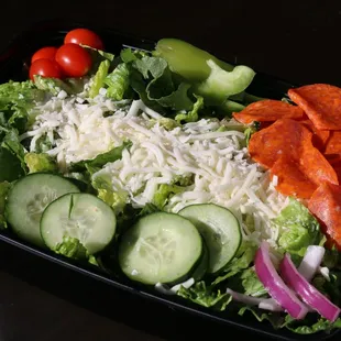 a salad in a plastic container