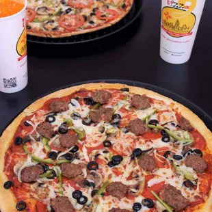 Deluxe and Veggie Delight Pizza