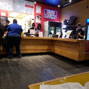 customers at the counter of a restaurant