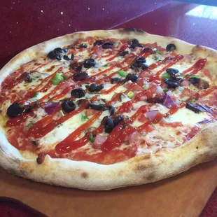 The Persian Jimmy: hotdogs and mortadella pizza topped with ketchup