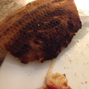 Burnt pizza crust.. Not good!