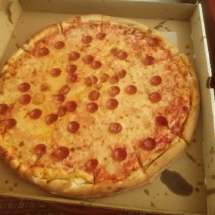 a pepperoni pizza in a box