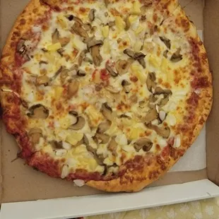 a pizza in a pizza box