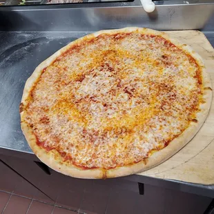 Lg cheese pizza    Monday special 9.99 only  Twoday