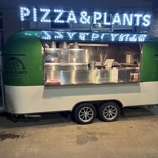 a food truck parked in a parking lot