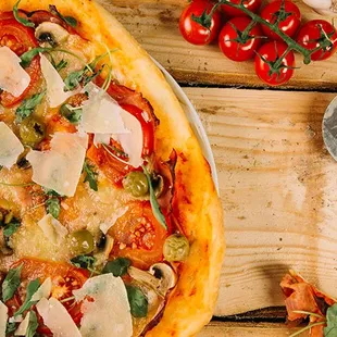  pizza on a wooden table