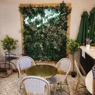 a table and chairs in a restaurant