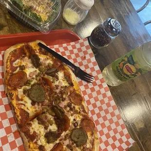 The Carnivore Pizza with a Side Salad