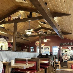 Farm toys in the rafters. Oh so cute.