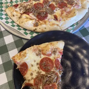 Pepperoni and Italian sausage pizza