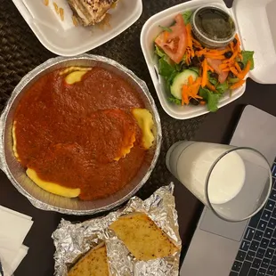 Cheese ravioli, red Marinara Sauce, Tiramisu, House Salad balsamic dressing and Garlic Bread (and my milk)