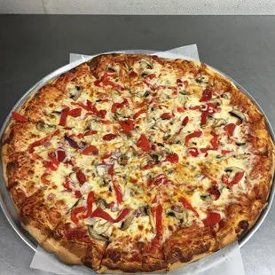 a whole pizza on a pan