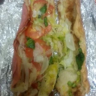 Soggy and brown lettuce slapped together hoagie.