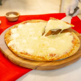 Four Cheese Pie: Mozzarella, feta, provolone &amp; ricotta.