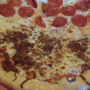 Half pepperoni/half sausage pizza...3 good sized pieces each