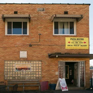 the entrance to a restaurant