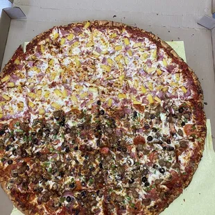 a whole pizza in a box