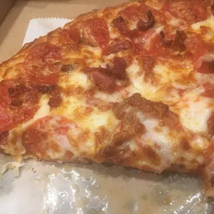 Up close of the pepperoni and bacon pizza!