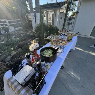 a long table with food on it