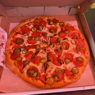 Pepperoni and jalapeño pizza