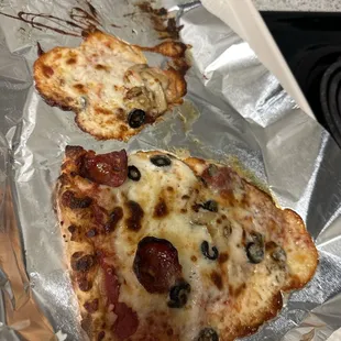 You can't tell where the crust is with all the cheese.