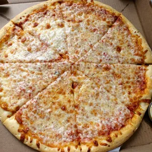 Pizzas served with a side of garlic sauce a la that OTHER BRAND which won&apos;t be named